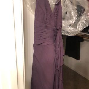 David’s bridal bridesmaid dress. One small tear in the hem. New with tags.